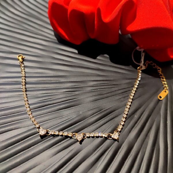 Ατσάλινο ZIRGON βραχιόλι με αλυσίδα και χρυσές καρδιές