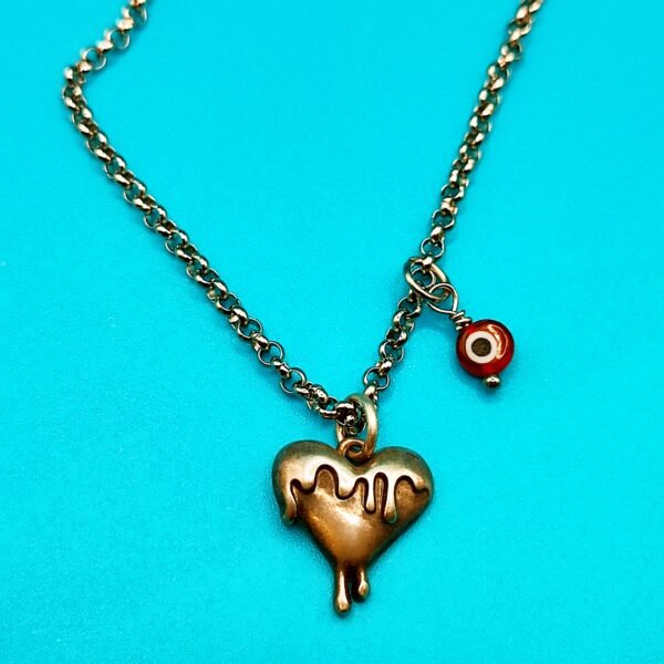 Ατσάλινη αλυσίδα με melted heart και ματάκι