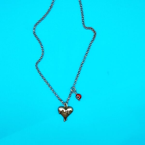 Ατσάλινη αλυσίδα με melted heart και ματάκι