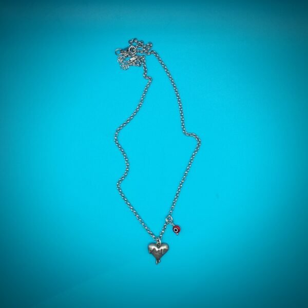 Ατσάλινη αλυσίδα με melted heart και ματάκι